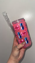 Can and bow snow globe